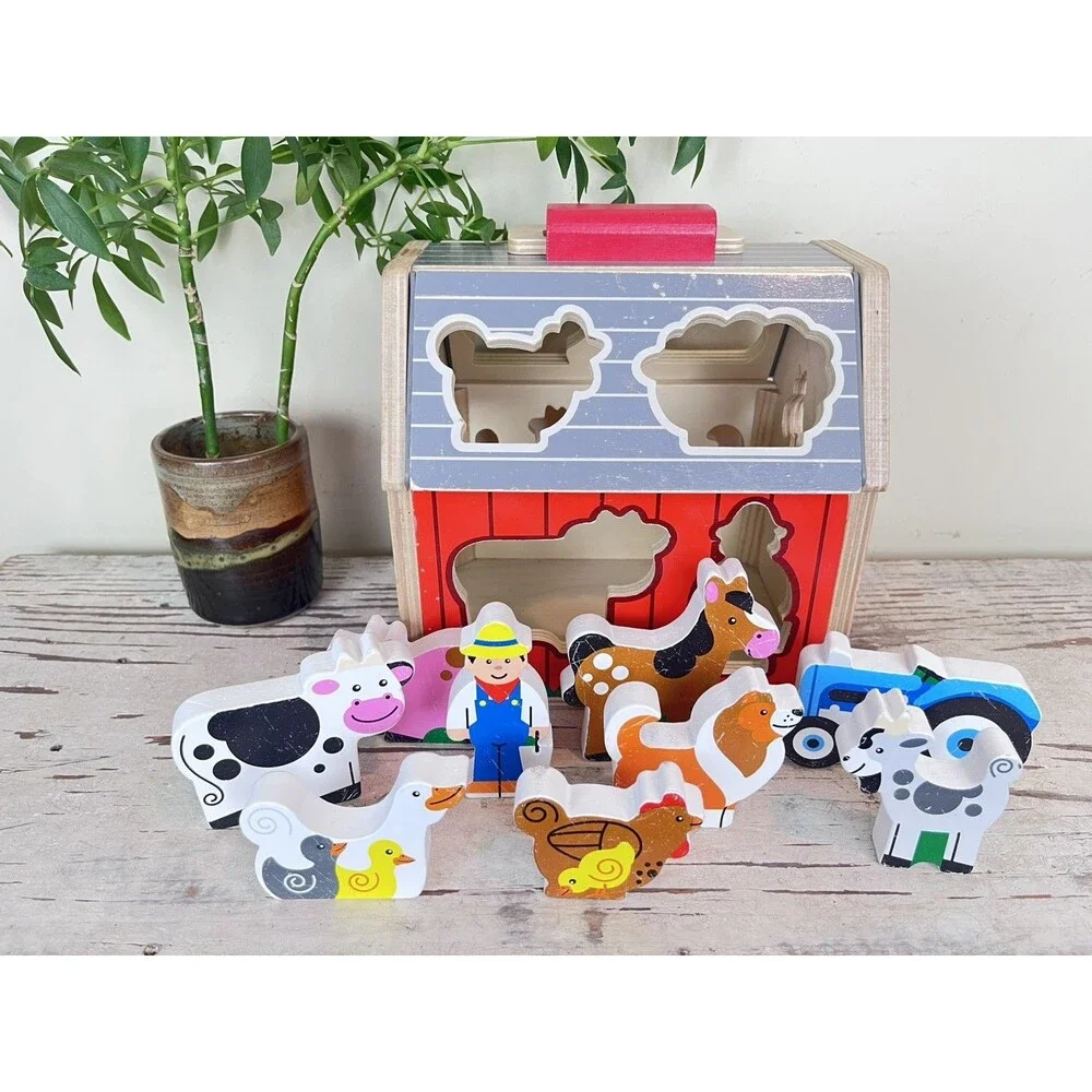 Melissa & Doug Wooden Take-Along Shape Sorting Barn with Flip-Up Roof 9 Figures
